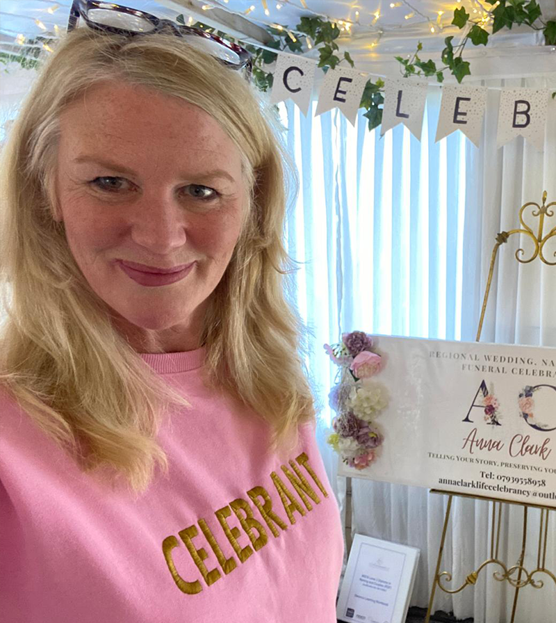 Anna wearing a Celebrant top at a wedding fair